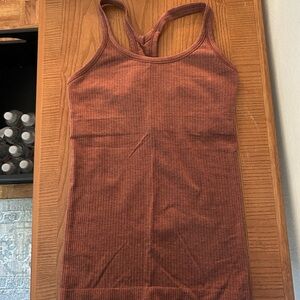 Lululemon ebb to street tank size 4 in the color rust